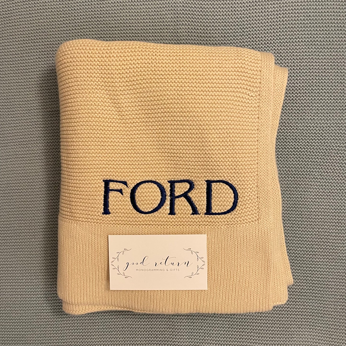 Scalloped Edge Knitted Blanket in Ivory